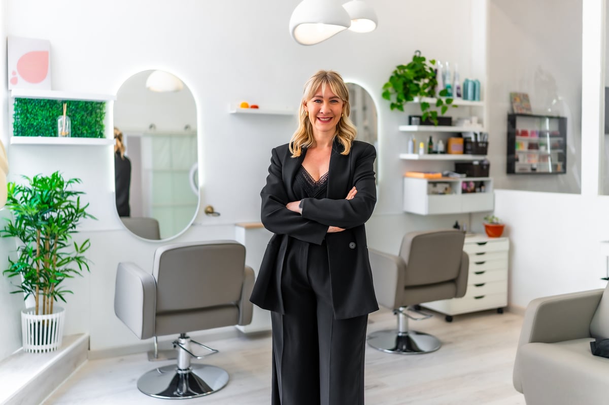 Portrait of a successful female entrepreneur posing proudly in her newly opened hair and beauty salon